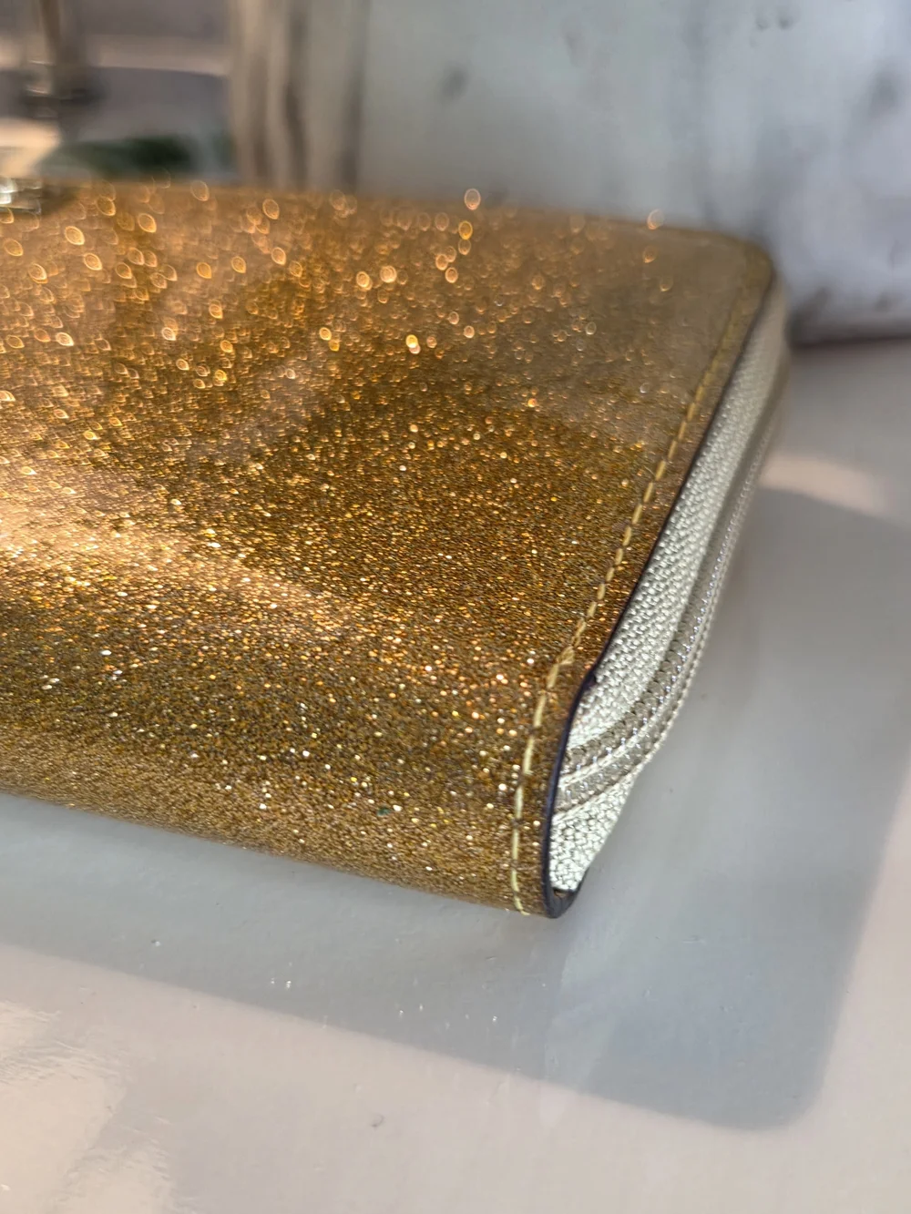 Kate Spade New York Mavis Street Neda Gold Glitter Wallet.